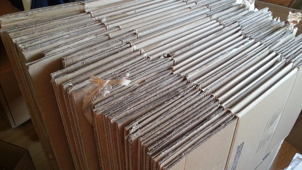 Cardboard moving boxes packed and ready for a house move