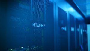 Rack-mounted servers and network equipment in a comms room, the kit moved during an office IT relocation