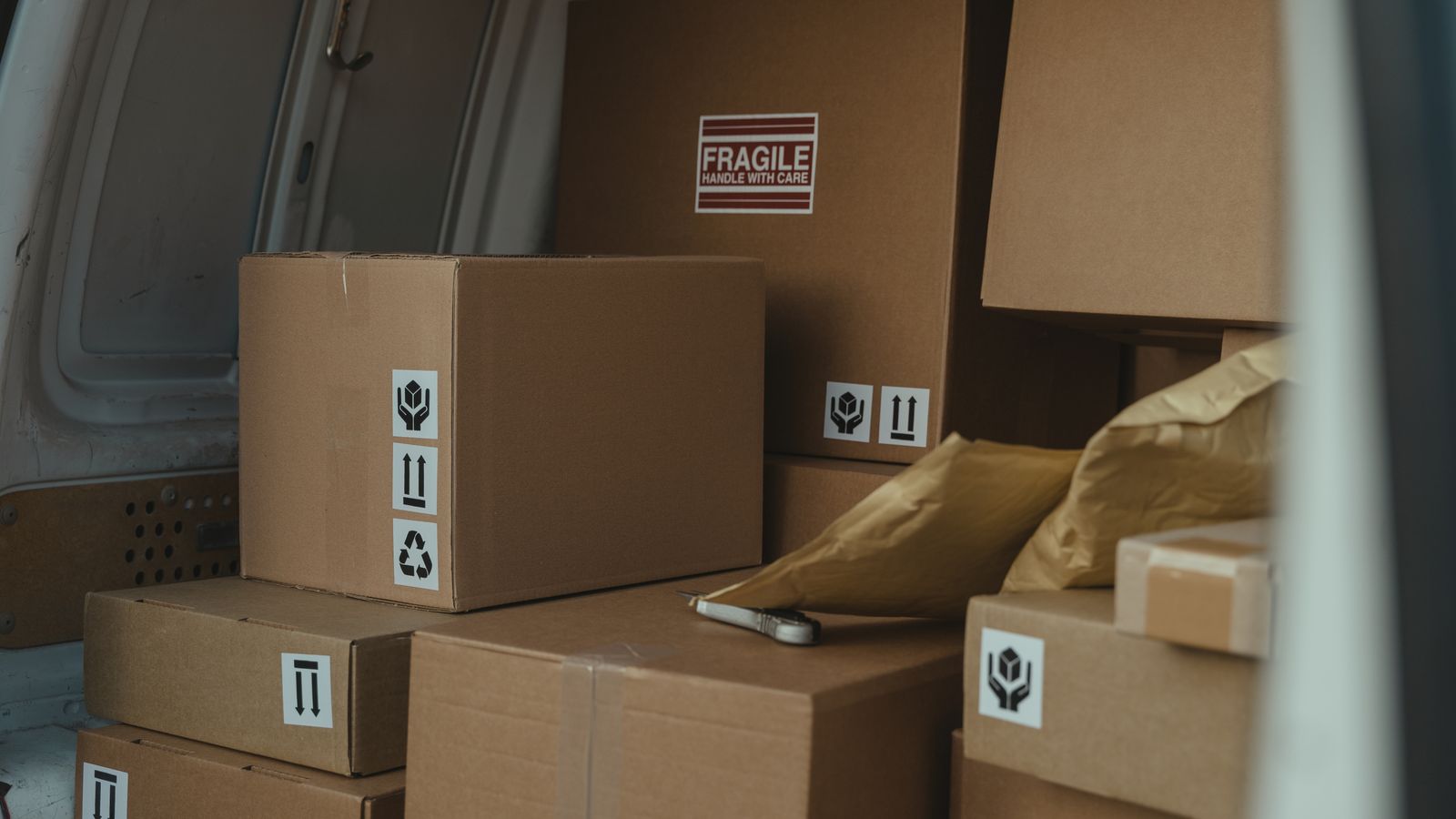 Boxes loaded neatly into the back of a van
