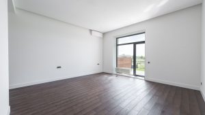 Empty room with parquet flooring
