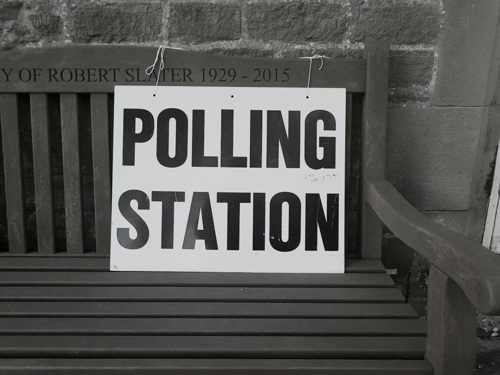 A polling station sign in the United Kingdom directing voters on polling day