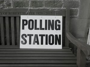 A polling station sign in the United Kingdom directing voters on polling day